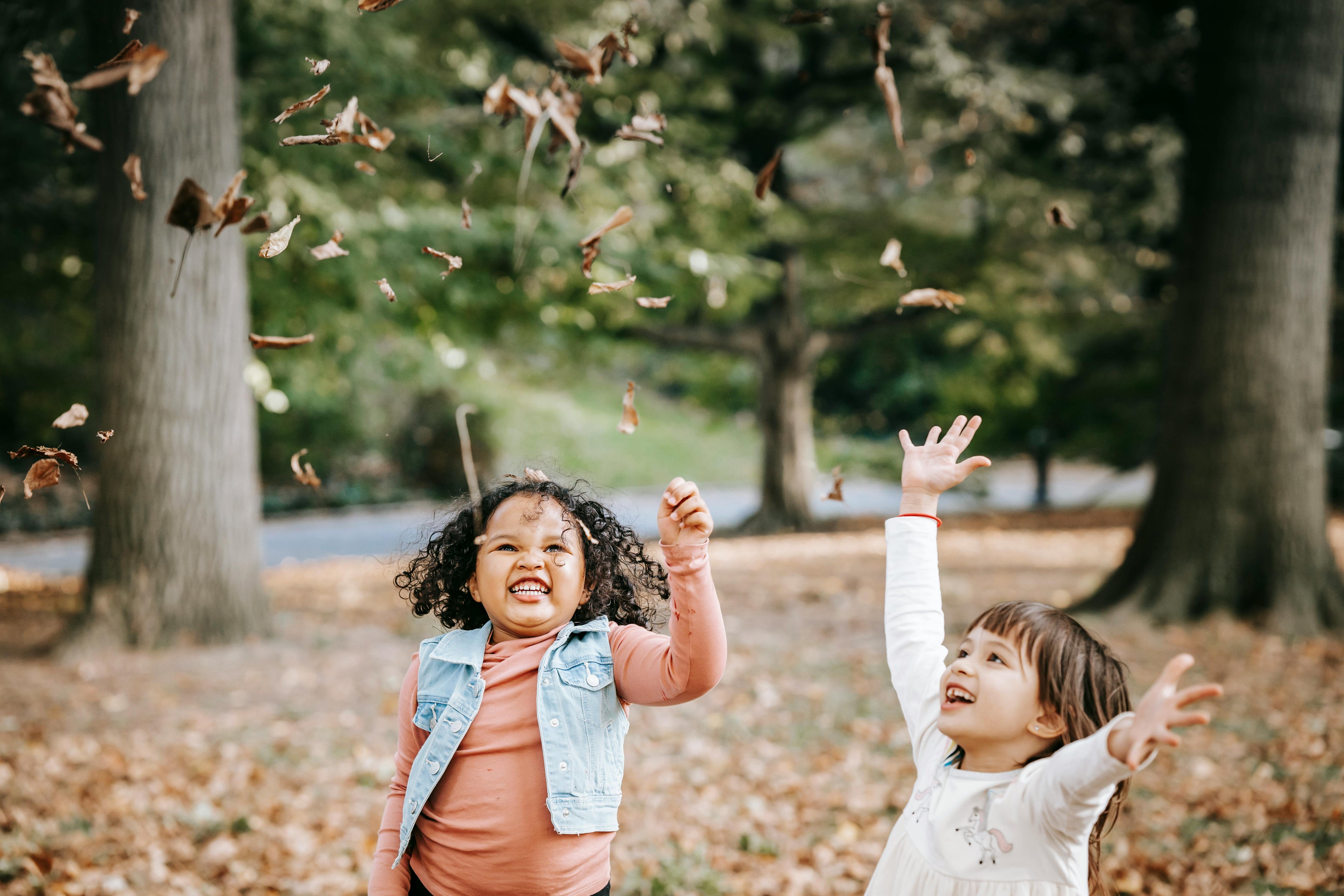 children playing in nature having fun